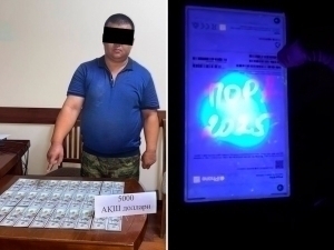 Head of customs checkpoint caught taking a bribe in Ferghana (video)