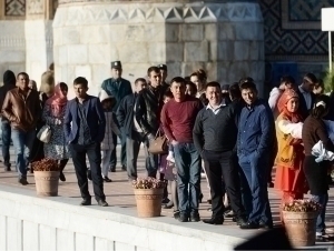How many people live per square kilometer in Uzbekistan?
