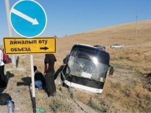 A bus traveling from Uzbekistan to Kyrgyzstan involved in a car accident in Kazakhstan