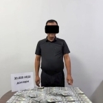 Аҳолини “тинчлантириш учун” тадбиркордан $360 минг талаб қилган шахс ушланди (видео)
