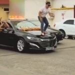 Man dances on hood of Malibu for trend in Tashkent, faces penalty (video)