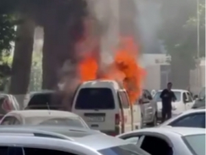 Emergency Crews Extinguish Car Fire in Tashkent