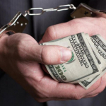 Коллеж директори ўринбосари 1000 доллар пора билан ушланди