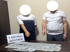 Farg‘onada kadastr bo‘limi mutaxassisi 5 ming dollar bilan qo‘lga tushdi