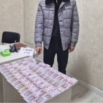 Andijonda IIO xodimi va universitet menejeri pora bilan ushlandi (video)