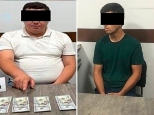 Tax inspector and security officer caught taking bribe in Jizzakh