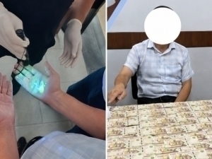 Тадбиркорнинг қарздорлигини камайтириш эвазига пул олган солиқчи ушланди 