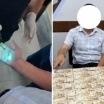 Тадбиркорнинг қарздорлигини камайтириш эвазига пул олган солиқчи ушланди 