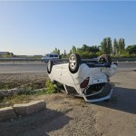 A Spark vehicle with passengers overturns in a traffic accident