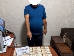 Xorijga chiqish taqiqini yechib berishni va’da qilgan bankir ushlandi