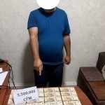 Xорижга чиқиш тақиқини ечиб беришни ваъда қилган банкир ушланди