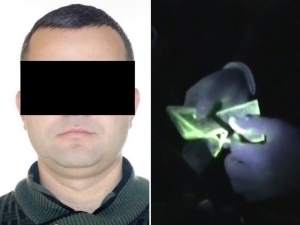 Namanganda bank xodimi 3 ming dollar pora bilan qo‘lga tushdi (video)