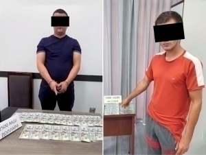 Божхона ва Солиқ қўмитасининг ходимлари пора билан ушланди (видео)