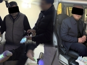 Қаршида ҳоким ёрдамчиси 1000 доллар билан қўлга тушди