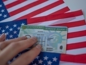 Now playing for a Green Card will cost money