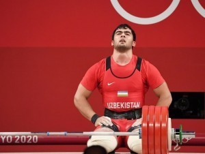 Why did the Olympic champion from Uzbekistan not perform at the World Cup?