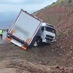 Truck falls into ditch in Kamchik Pass