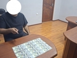 Driving school employee arrested in Ferghana for promising licenses