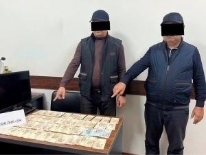 Police officers caught accepting bribe in Syrdarya