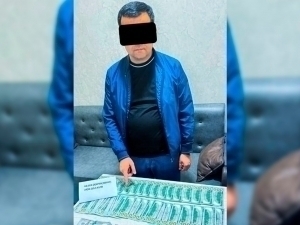 Андижонда мансабдор 40 минг доллар пора билан ушланди