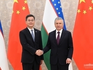 China's finance minister conveys Xi Jinping's greetings to Mirziyoyev