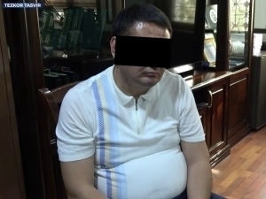 Судья катта ёрдамчиси 53 минг доллар пора билан ушланди (видео)