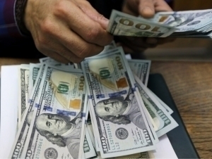 Official dollar exchange rate rises slightly in Uzbekistan