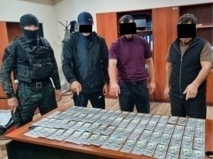 Қалбаки 7400 долларни 44 млн сўмга сотганлар қўлга тушди