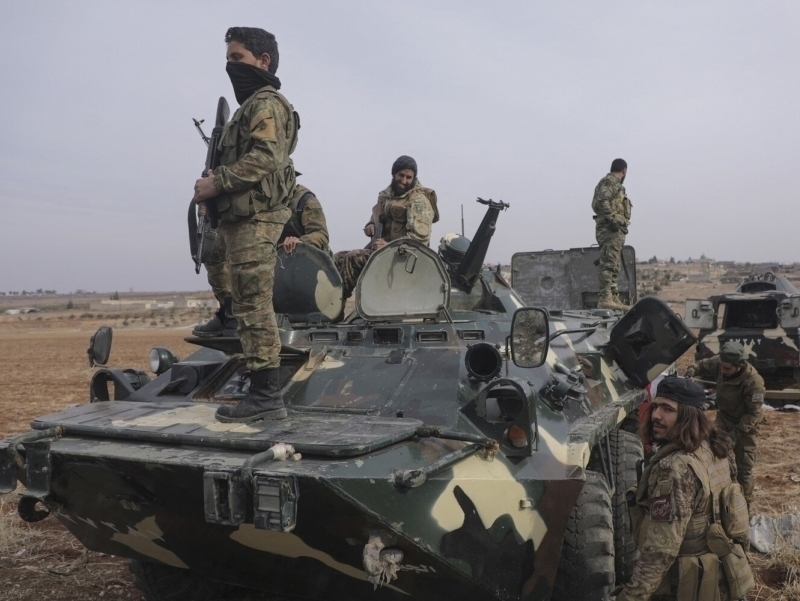 Сурияда Асад тарафдорлари ва янги ҳукумат кучлари ўртасида қонли жанглар бошланди