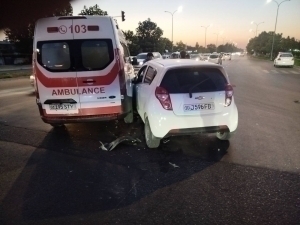 Spark crashes into an ambulance at a city intersection