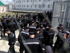 How many people are imprisoned in Uzbekistan?