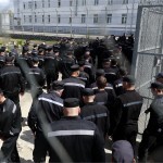How many people are imprisoned in Uzbekistan?