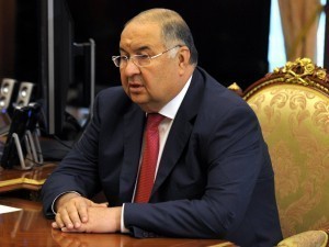 Did billionaire Alisher Usmanov return to Uzbekistan, giving up his business?