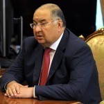 Did billionaire Alisher Usmanov return to Uzbekistan, giving up his business?