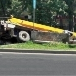 Truck crane falls into a pit in Tashkent