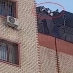 Girl attempting to jump from 9th floor stopped by police in Tashkent