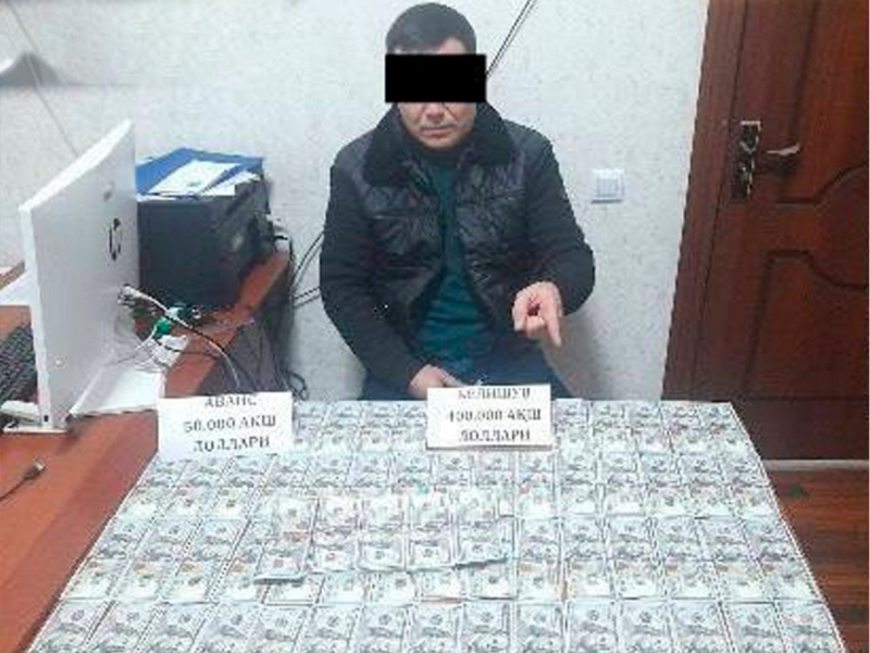 Farg‘onada mansabdor 50 ming dollar pora olayotganda ushlandi