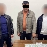 Soxta DXX xodimi 10 ming dollar bilan ushlandi