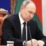 Putin signs law raising fees for migrants and vehicle services