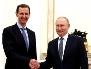 Путин Асад билан учрашди