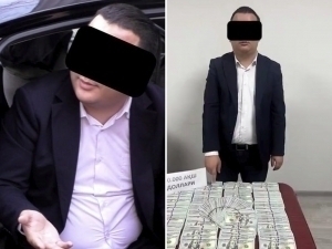 Nufuzli bankning mansabdori 30 ming dollar bilan qo‘lga tushdi (video)