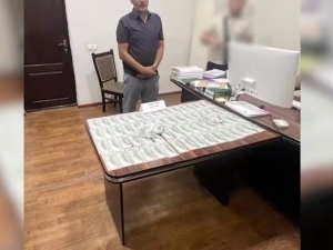 Хоразмда терговчига пора берган шахс ушланди (видео)