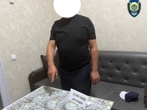 Андижонда мансабдор 8,5 минг доллар пора билан ушланди