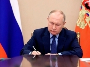 Putin signs new law on migrant residency