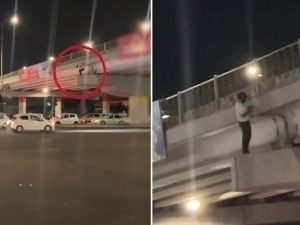 Man attempts to jump off a bridge in Tashkent