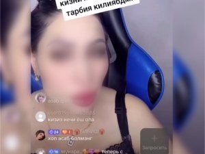 TikTok жонли эфирида она фарзандини калтаклади (видео)