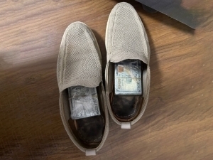 Person was caught for attempting to smuggle $20,000 in his shoes out of Uzbekistan (video)